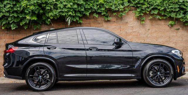used 2021 BMW X4 car, priced at $31,487