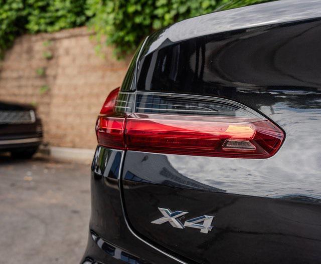 used 2021 BMW X4 car, priced at $31,487