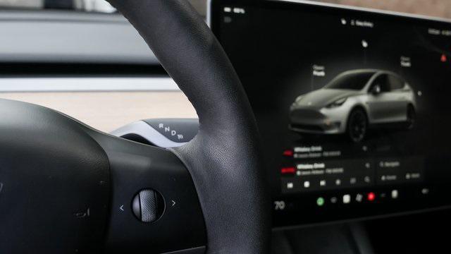 used 2024 Tesla Model Y car, priced at $33,881