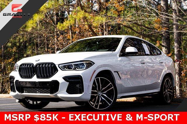 used 2023 BMW X6 car, priced at $59,399