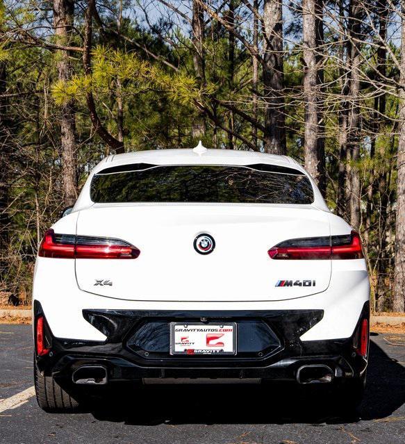 used 2023 BMW X4 car, priced at $54,499