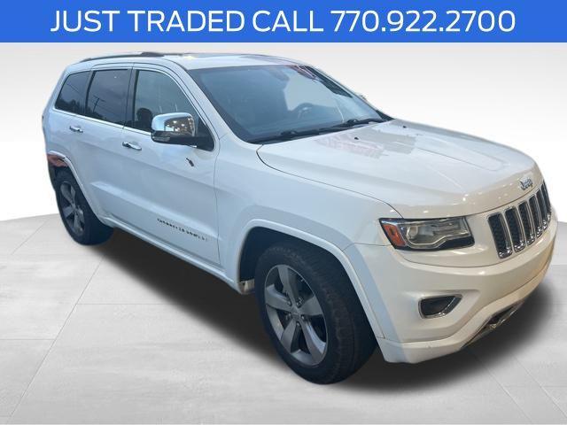 used 2014 Jeep Grand Cherokee car, priced at $10,000