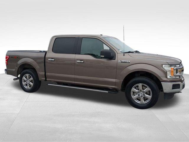 used 2018 Ford F-150 car, priced at $15,000