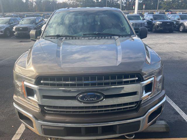 used 2018 Ford F-150 car, priced at $15,000