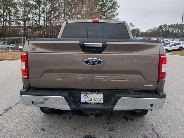 used 2018 Ford F-150 car, priced at $15,000