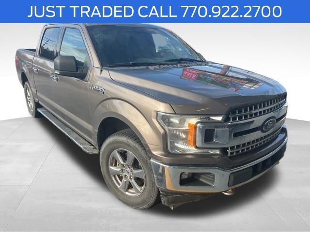 used 2018 Ford F-150 car, priced at $15,000