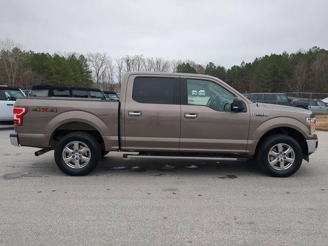 used 2018 Ford F-150 car, priced at $15,000