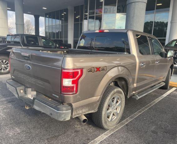 used 2018 Ford F-150 car, priced at $15,000