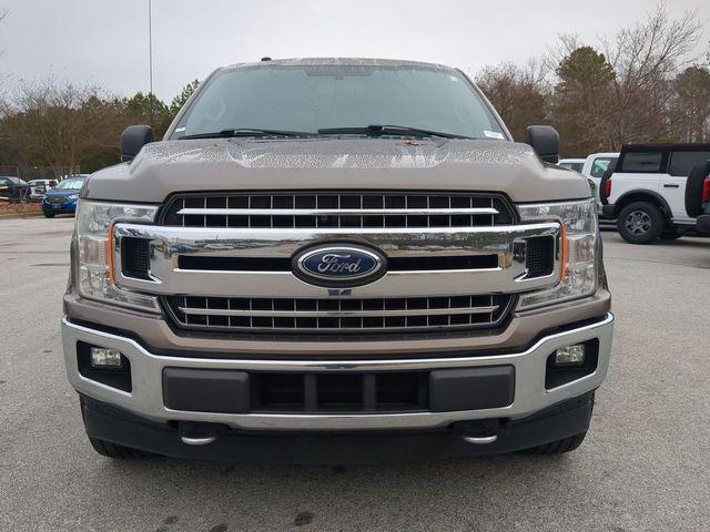 used 2018 Ford F-150 car, priced at $15,000