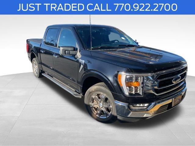 used 2021 Ford F-150 car, priced at $37,644