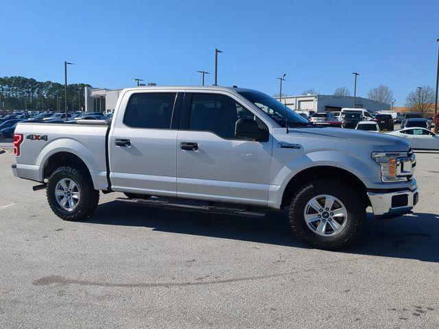 used 2018 Ford F-150 car, priced at $23,119