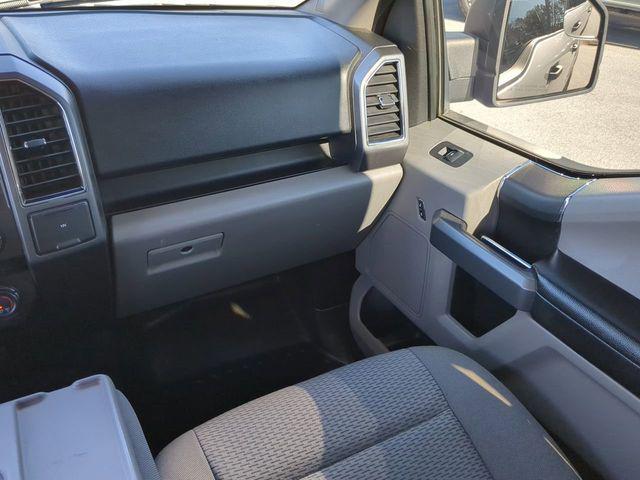 used 2018 Ford F-150 car, priced at $23,119