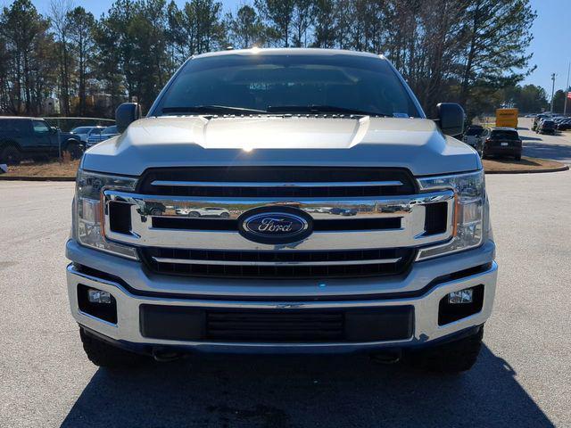 used 2018 Ford F-150 car, priced at $23,119