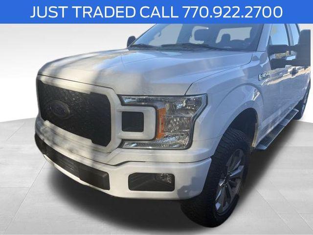 used 2018 Ford F-150 car, priced at $23,737