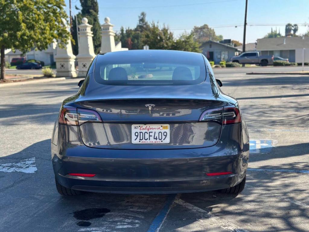 used 2022 Tesla Model 3 car, priced at $24,999