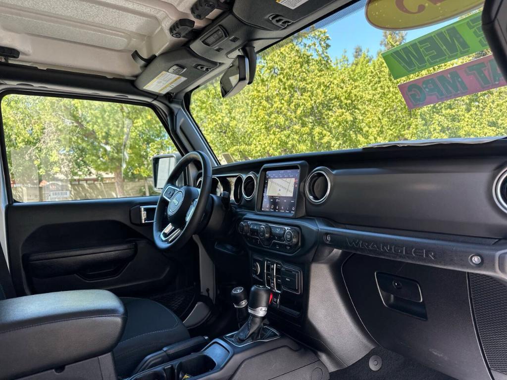used 2023 Jeep Wrangler 4xe car, priced at $33,339