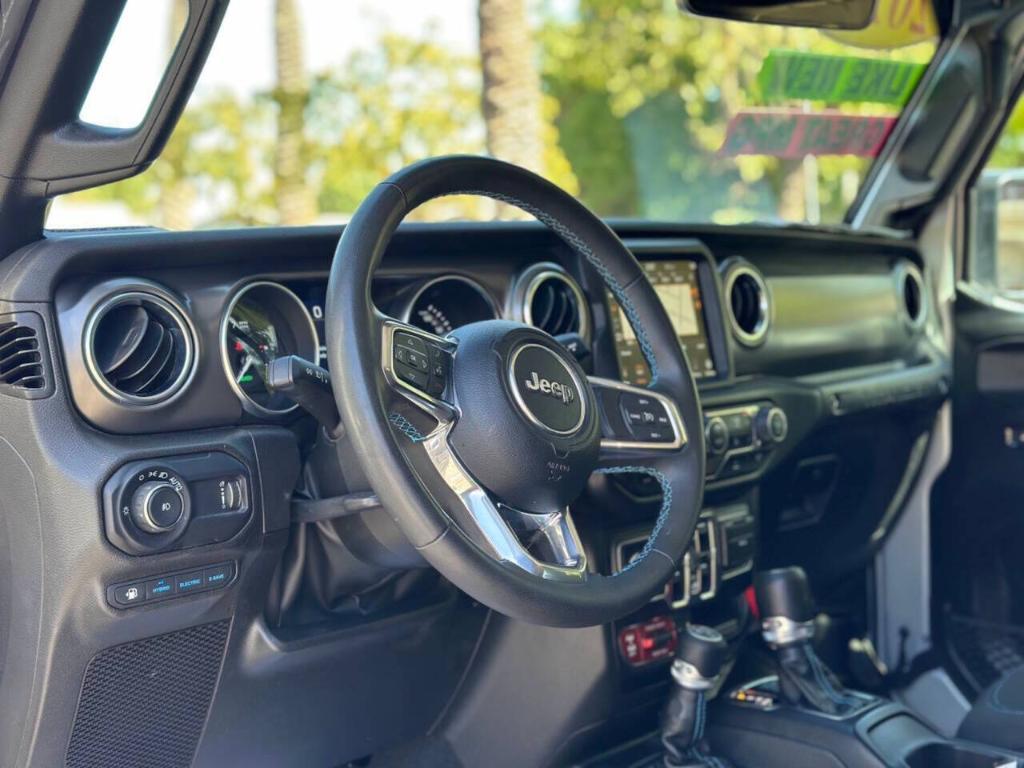 used 2023 Jeep Wrangler 4xe car, priced at $32,997