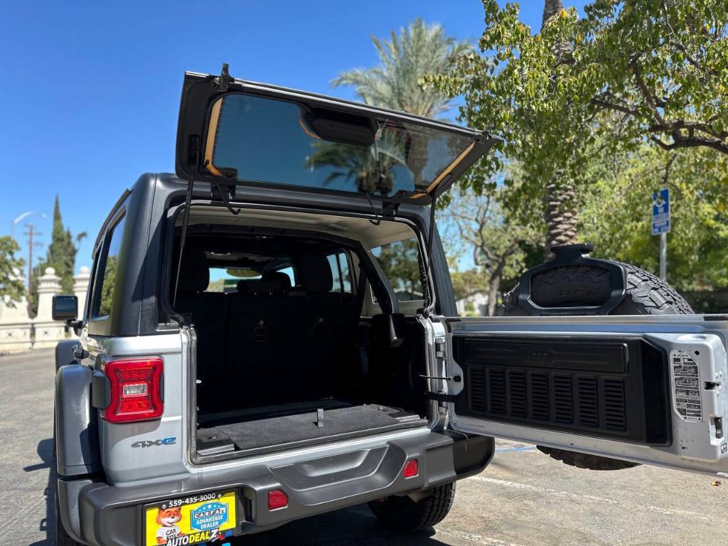 used 2023 Jeep Wrangler 4xe car, priced at $33,339