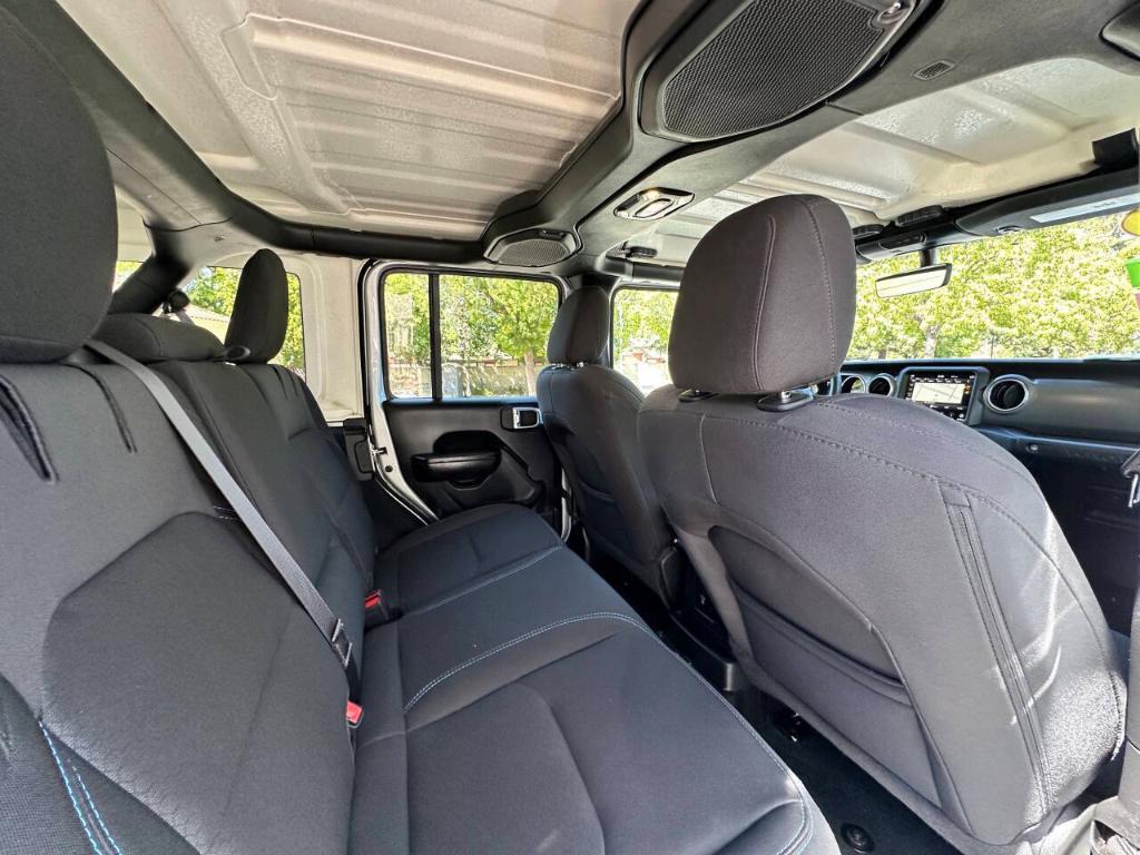 used 2023 Jeep Wrangler 4xe car, priced at $33,339