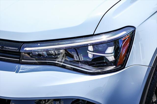 new 2025 Volkswagen Taos car, priced at $28,948