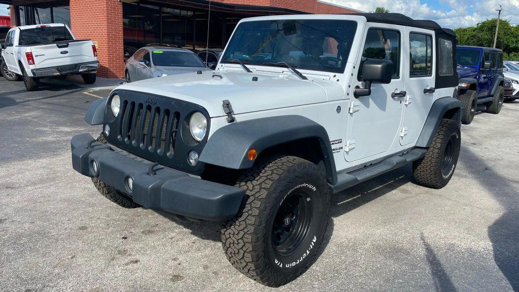 used 2014 Jeep Wrangler Unlimited car, priced at $14,499