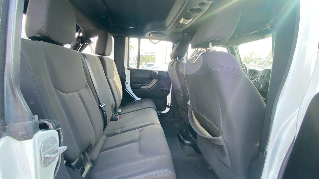 used 2014 Jeep Wrangler Unlimited car, priced at $14,499