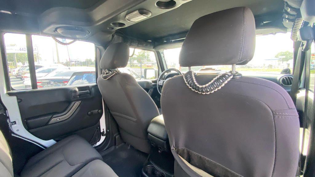 used 2014 Jeep Wrangler Unlimited car, priced at $14,499