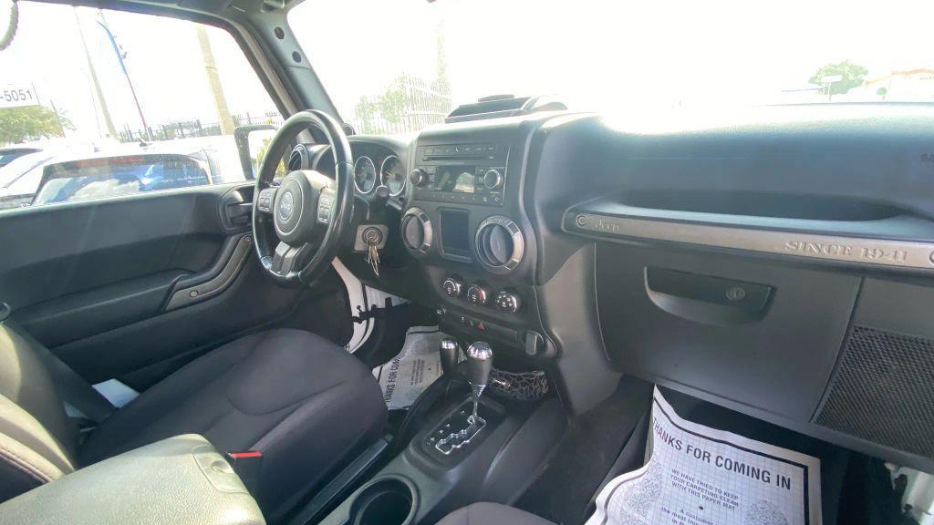 used 2014 Jeep Wrangler Unlimited car, priced at $14,499