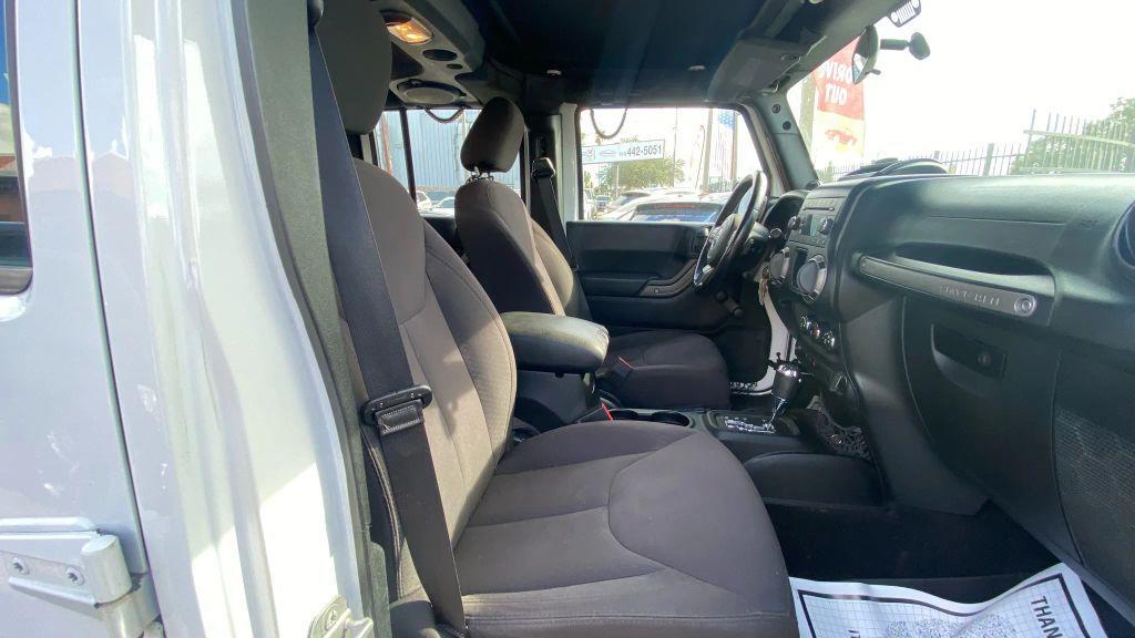 used 2014 Jeep Wrangler Unlimited car, priced at $14,499