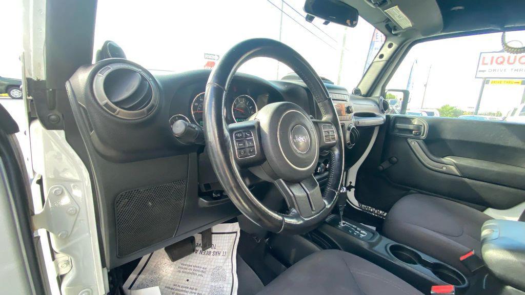 used 2014 Jeep Wrangler Unlimited car, priced at $14,499