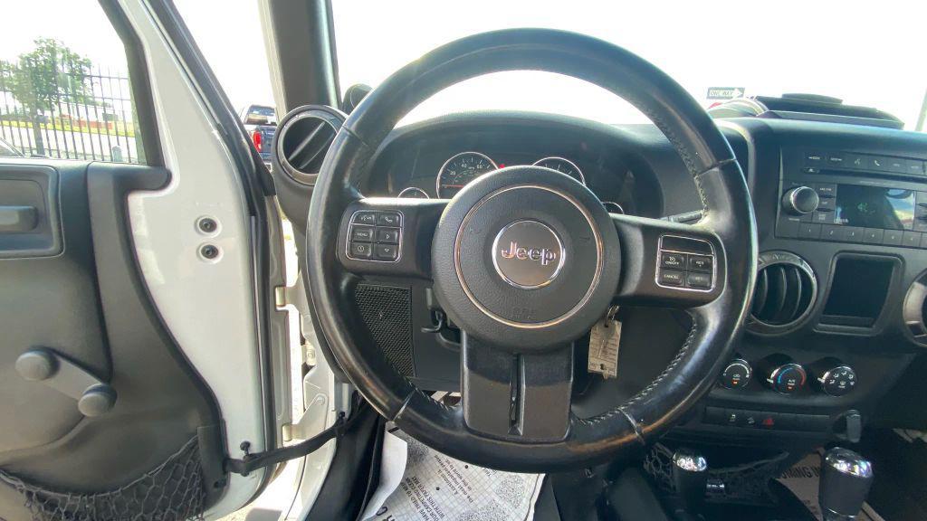 used 2014 Jeep Wrangler Unlimited car, priced at $14,499