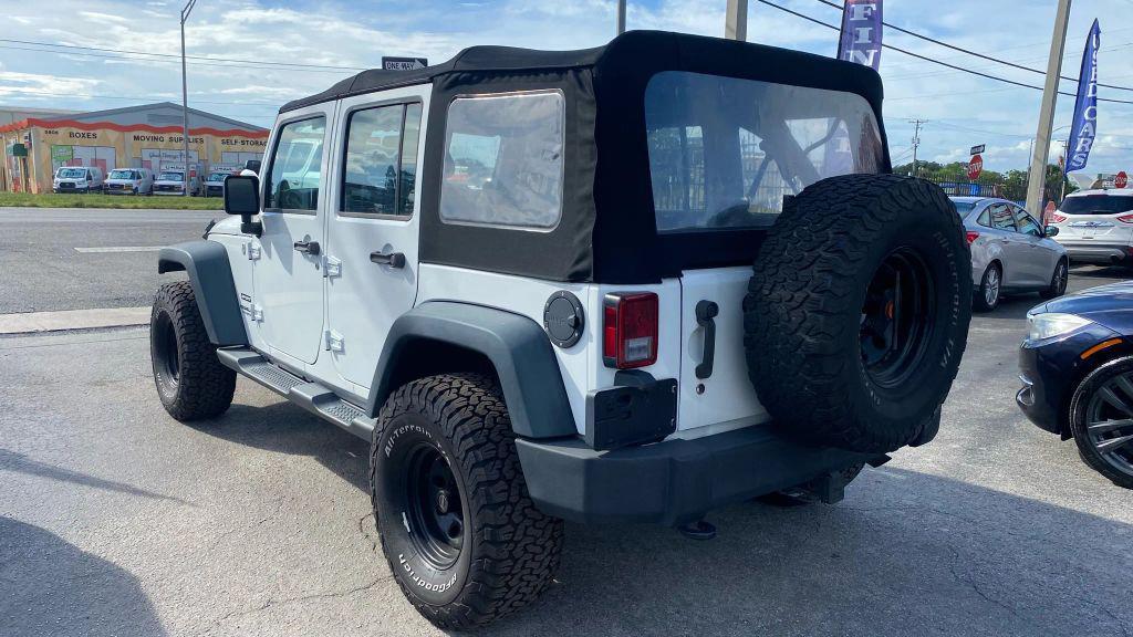 used 2014 Jeep Wrangler Unlimited car, priced at $14,499