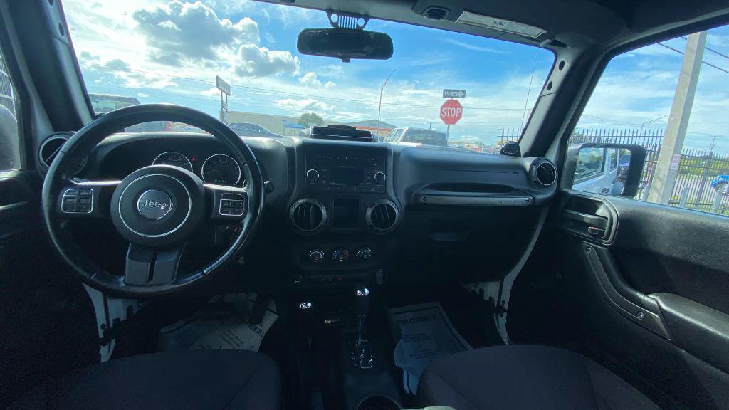 used 2014 Jeep Wrangler Unlimited car, priced at $14,499