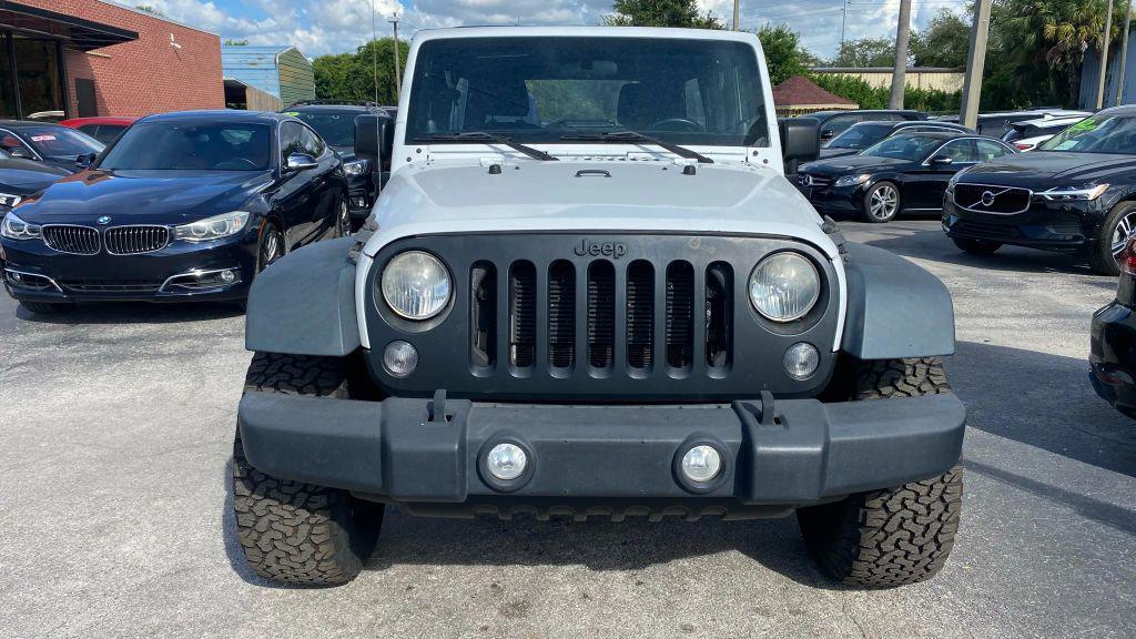 used 2014 Jeep Wrangler Unlimited car, priced at $14,499