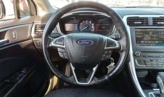 used 2016 Ford Fusion car, priced at $6,999