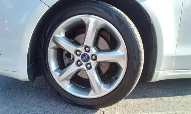 used 2016 Ford Fusion car, priced at $6,999