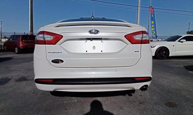 used 2016 Ford Fusion car, priced at $6,999