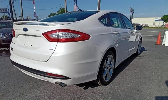 used 2016 Ford Fusion car, priced at $6,999