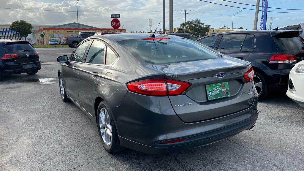 used 2014 Ford Fusion car, priced at $6,999