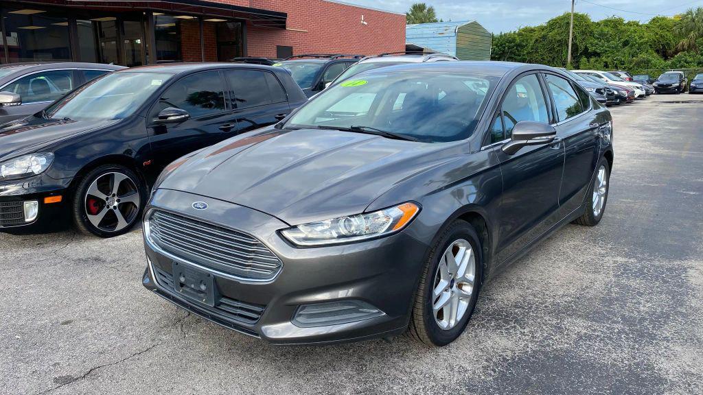 used 2014 Ford Fusion car, priced at $6,999