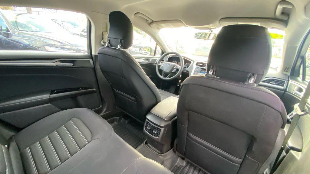 used 2014 Ford Fusion car, priced at $6,999