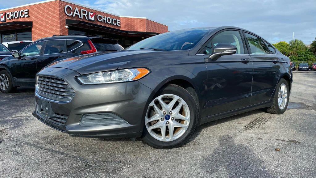 used 2014 Ford Fusion car, priced at $6,999