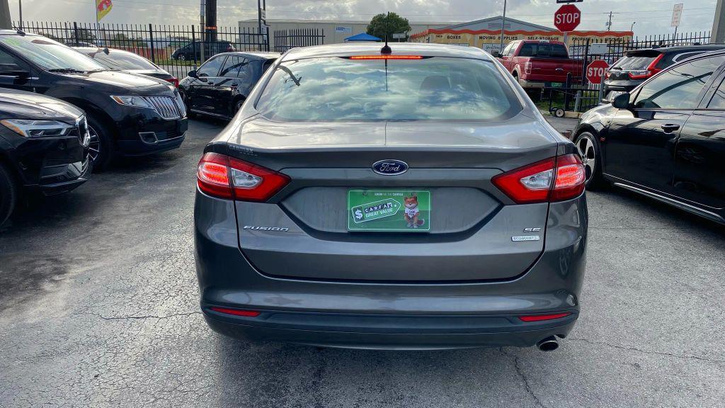 used 2014 Ford Fusion car, priced at $6,999