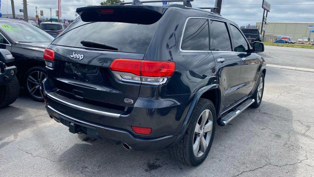 used 2014 Jeep Grand Cherokee car, priced at $10,999