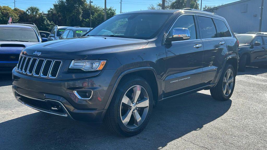 used 2015 Jeep Grand Cherokee car, priced at $11,999