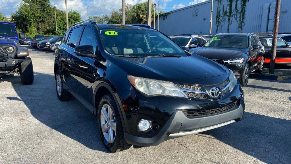 used 2013 Toyota RAV4 car, priced at $10,999