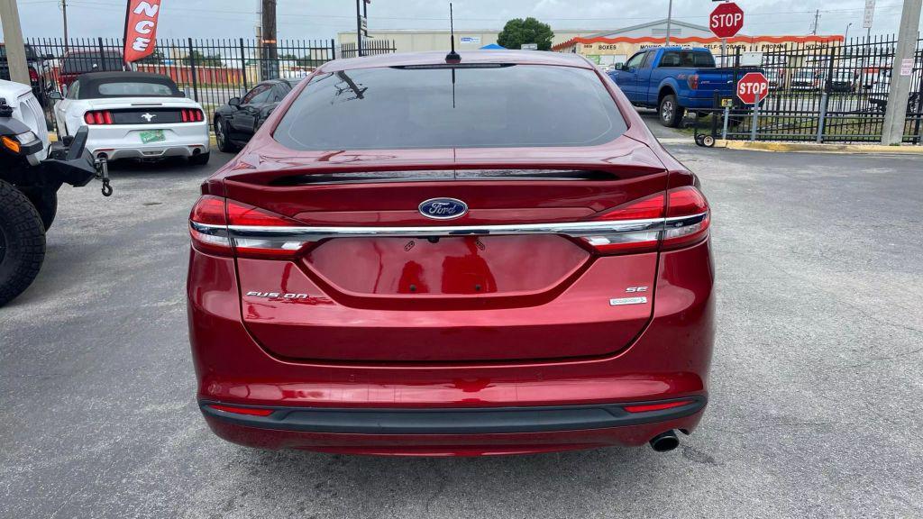 used 2018 Ford Fusion car, priced at $7,999