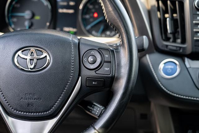 used 2018 Toyota RAV4 Hybrid car, priced at $23,977