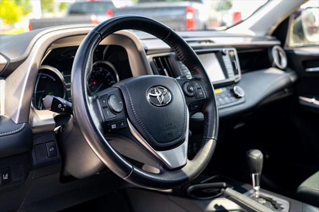 used 2018 Toyota RAV4 Hybrid car, priced at $23,977