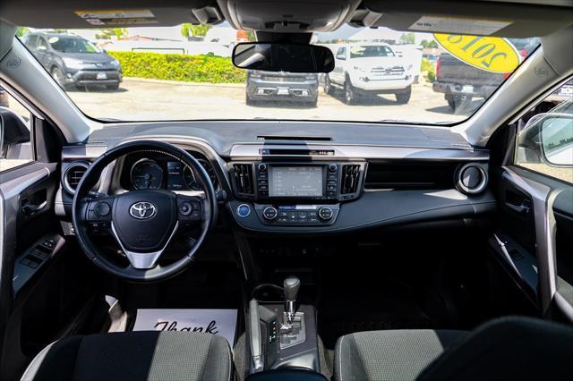 used 2018 Toyota RAV4 Hybrid car, priced at $23,977